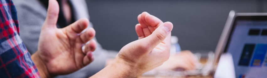 Hands gesturing mid conversation